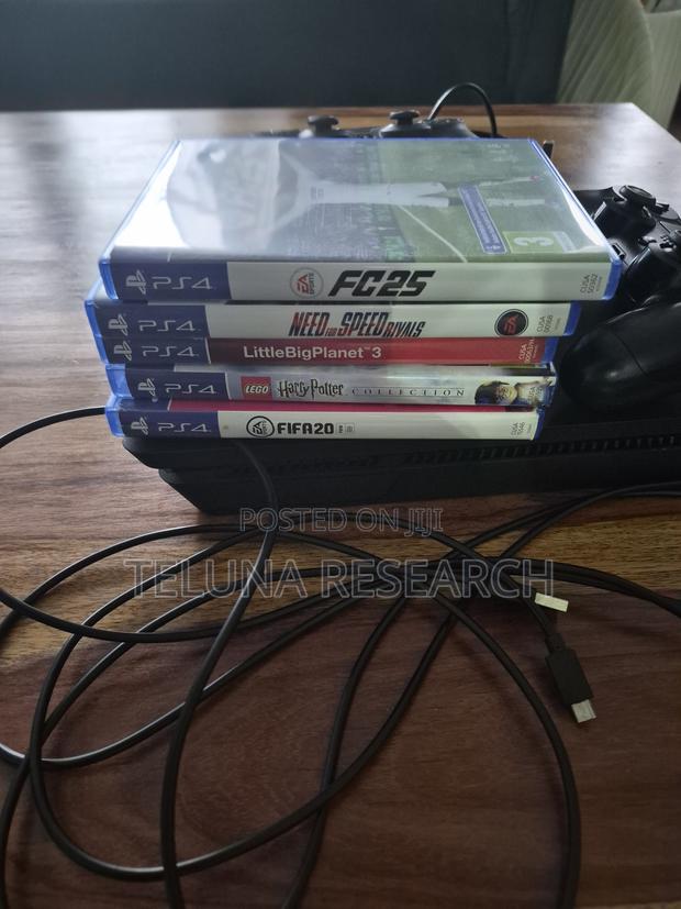 Used Ps4 Slim Ex -Uk 500 Gb With 2 Controllers and 4 Games