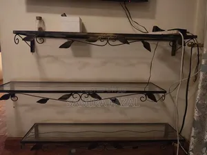 Wrought Iron Wall Self With Glass Leaf Shaped Accent .