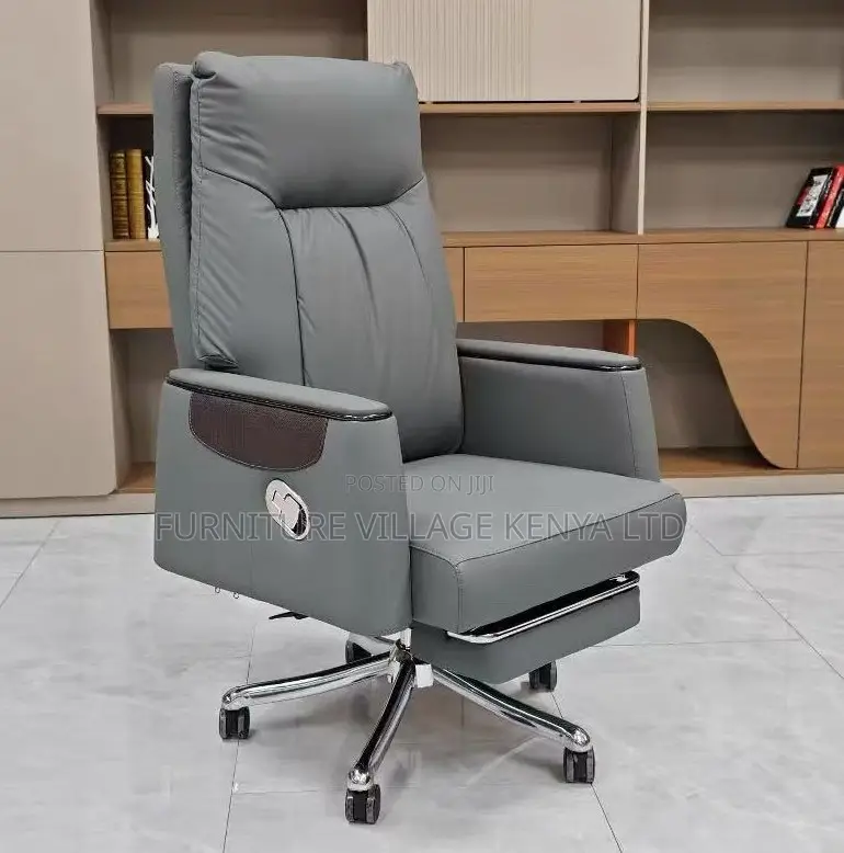 Leather Swivel Chair With Reclining Footrest