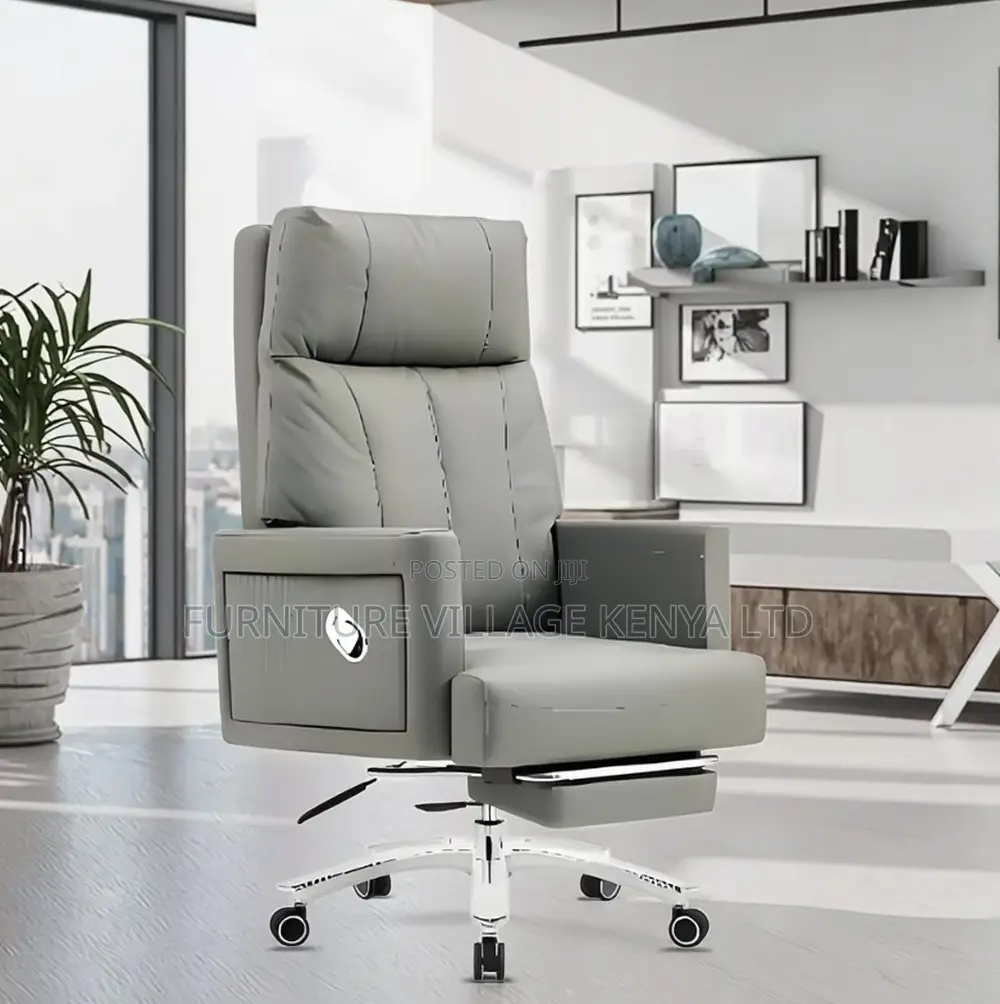 Leather Swivel Chair With Reclining Footrest