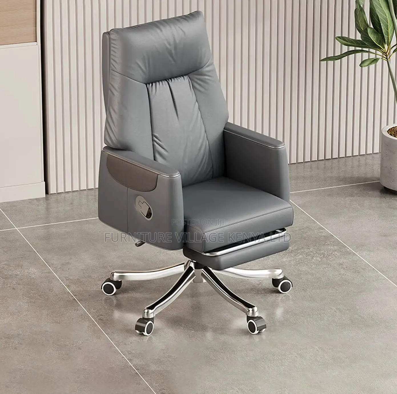 Leather Swivel Chair With Reclining Footrest