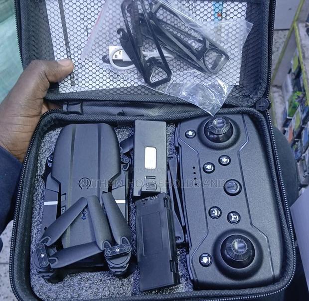 Drone. E88 Pro Drone. Foldable Quadcopter With 3 Batteries