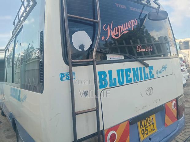 Toyota Coaster 2015 White - thumbnail 4