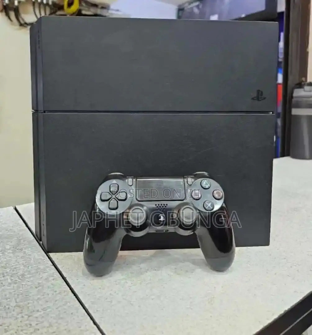 Sony Ps4 With 2 Controllers in Great Conditionition