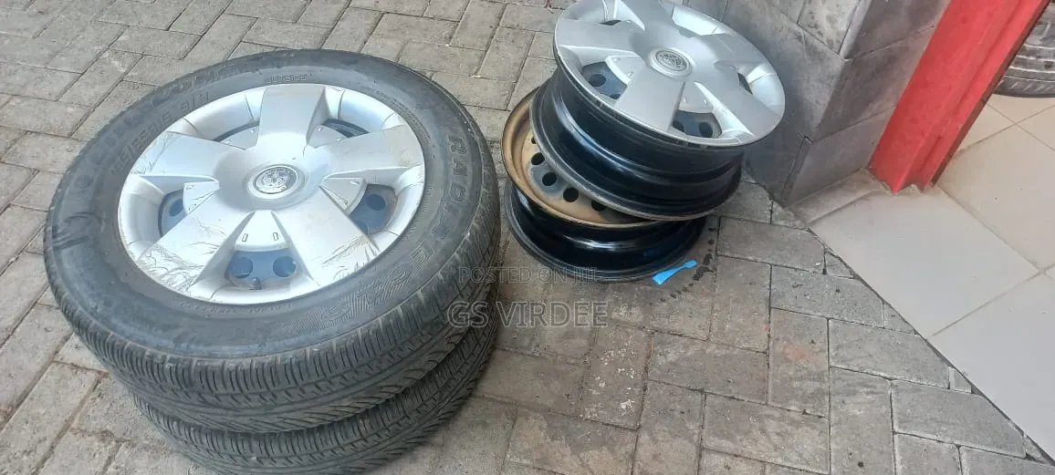 Toyota 4 Rims 2 Tyres 4 Wherl Caps
