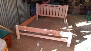 5x6 Wooden Bed With Clear Varnish.