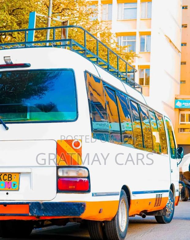 Toyota Coaster 2007 White - thumbnail 2