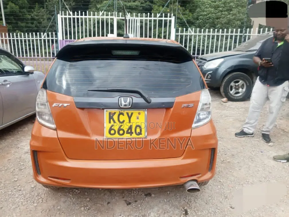 Honda Fit 5D Sport 2013 Orange