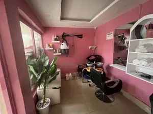 Salon Equipment, Including Lights, and Ring Ligh on the Ceiling.