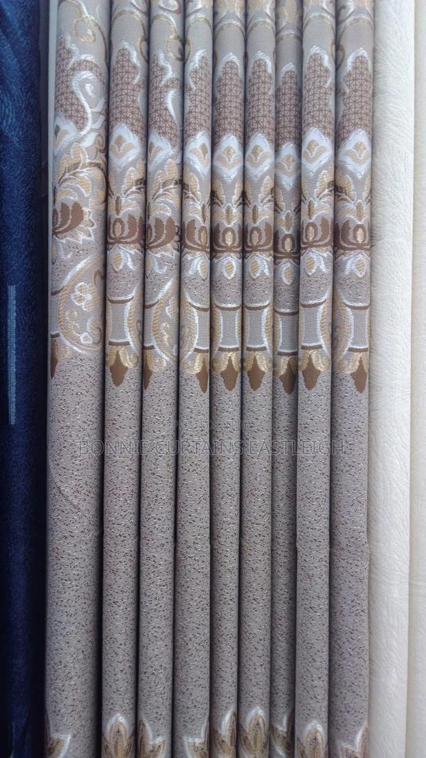 Brown Curtains and Sheers With Rings