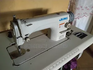Juki DDL-8700 Industrial Sewing Machine .