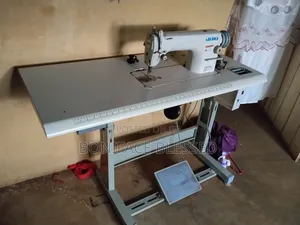 Juki DDL-8700 Industrial Sewing Machine .