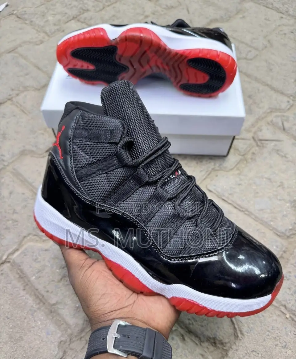 Nike Air Jordan 11 Retro Featuring a Unique Black Textured Mudguard