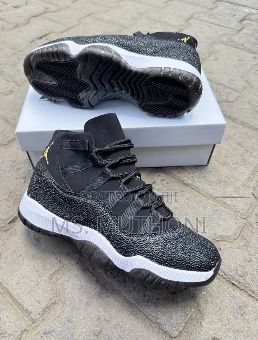 Nike Air Jordan 11 Retro Featuring a Unique Black Textured Mudguard