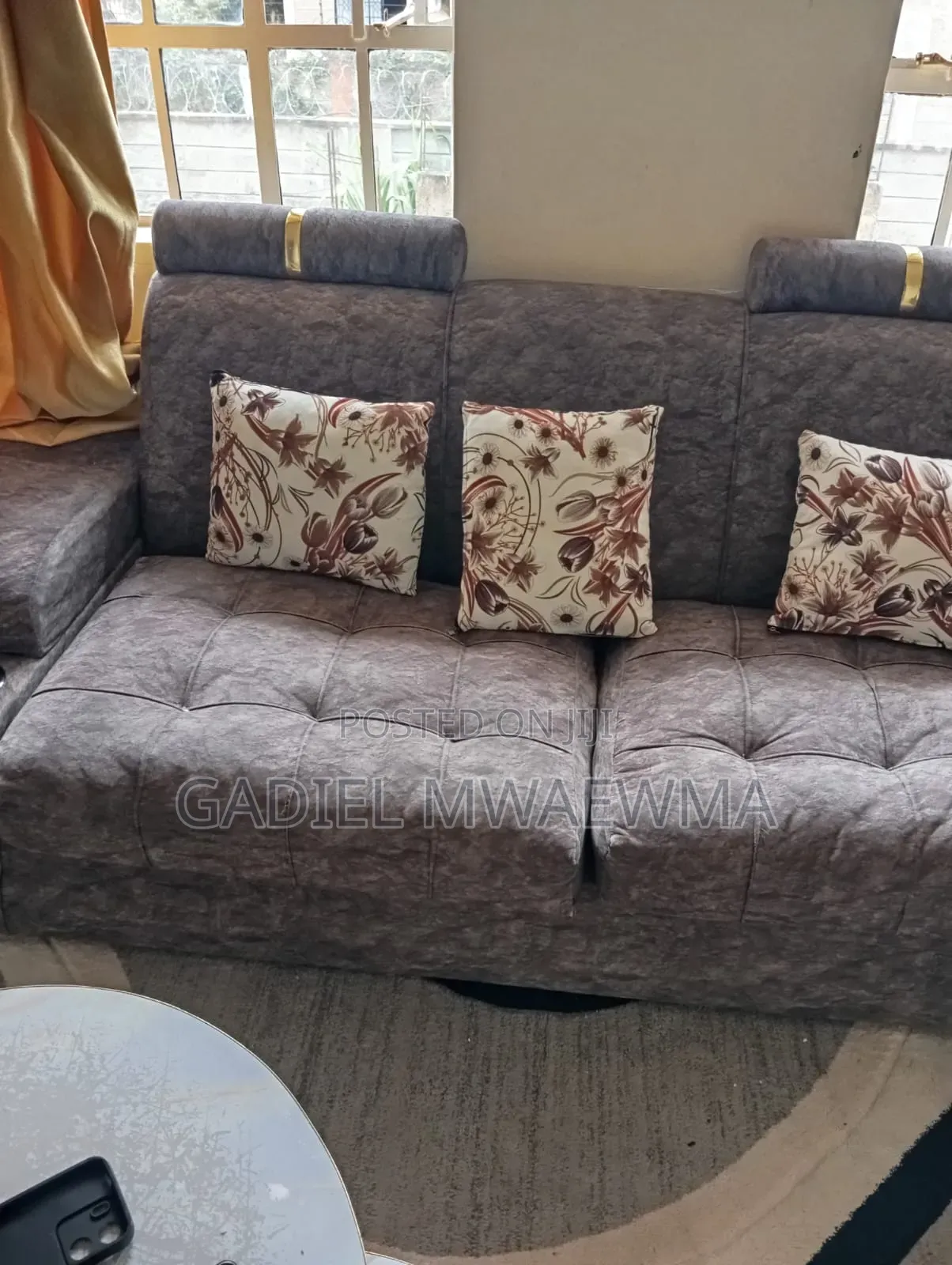 Used Grey L-Shaped Sofa in Good Condition. Comes With Mini Tables