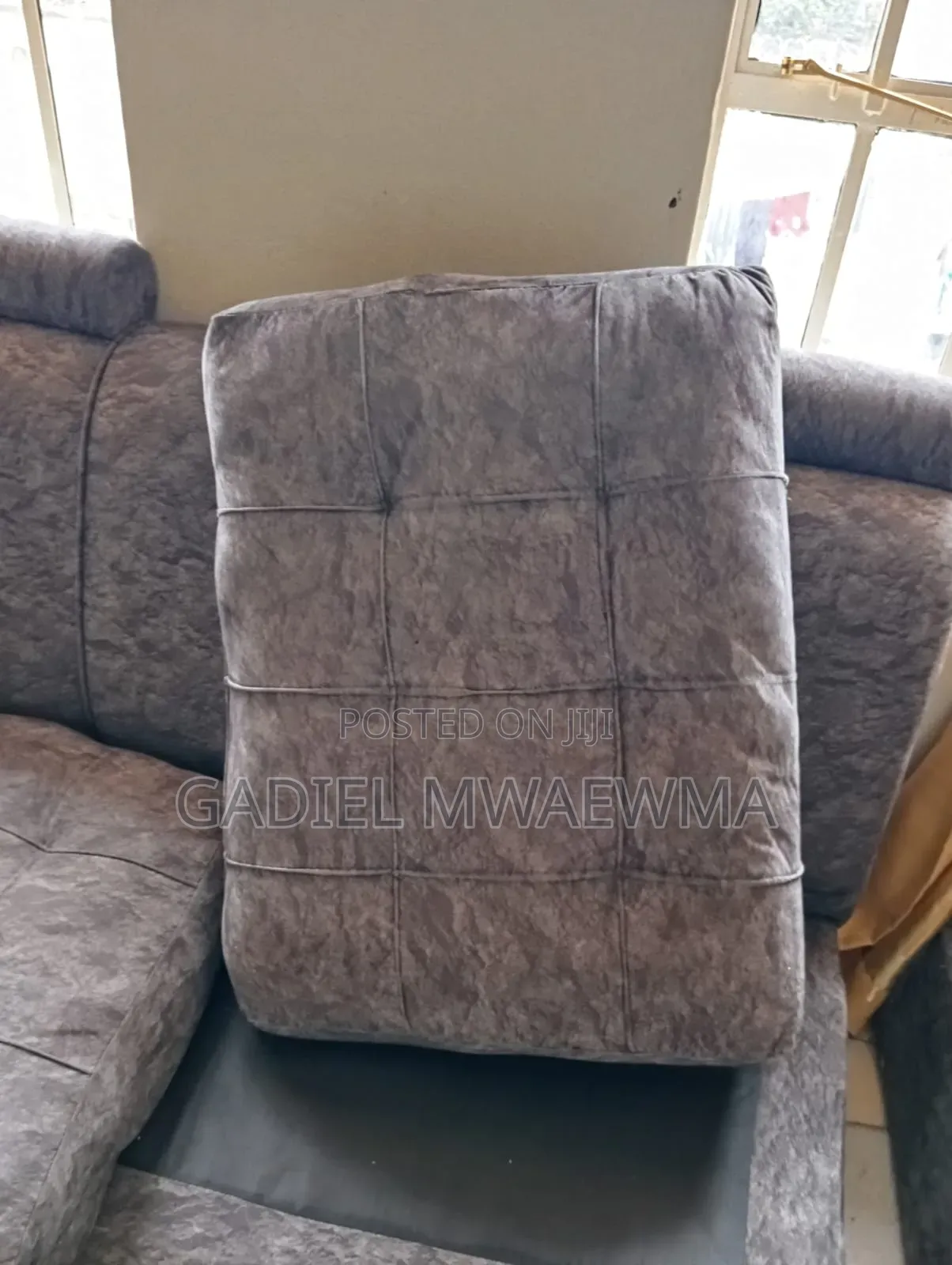 Used Grey L-Shaped Sofa in Good Condition. Comes With Mini Tables