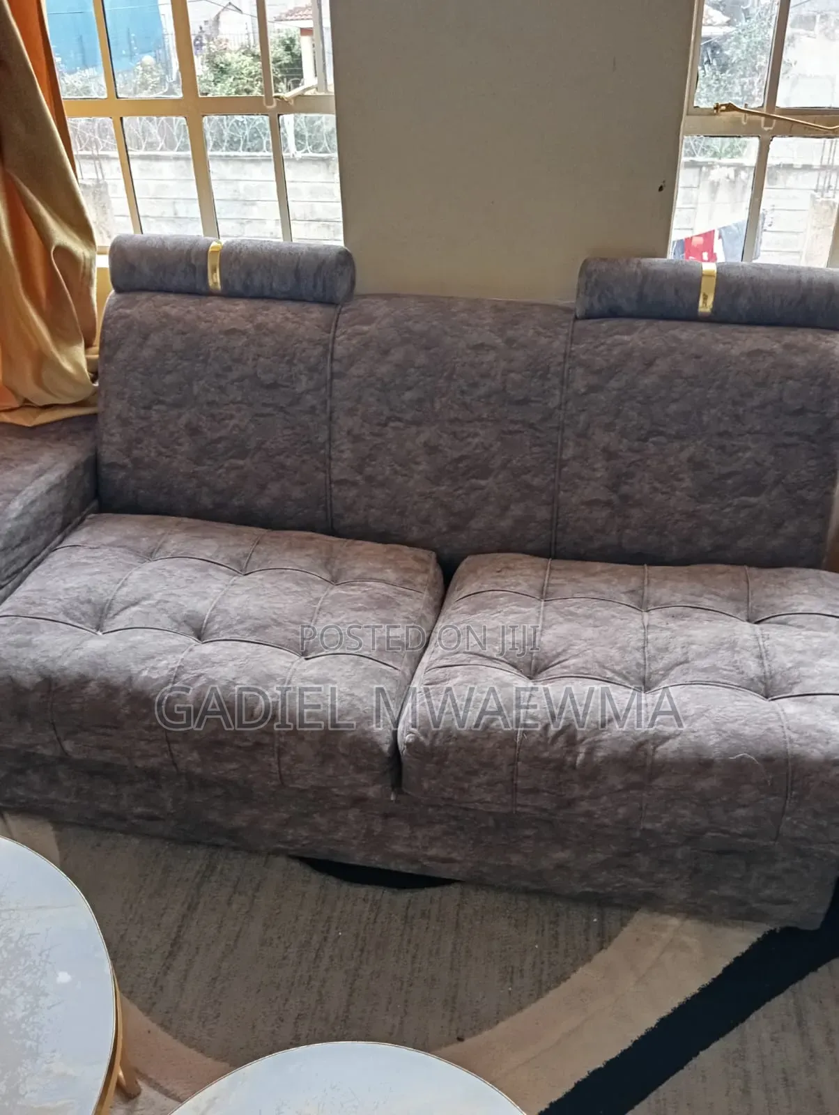 Used Grey L-Shaped Sofa in Good Condition. Comes With Mini Tables