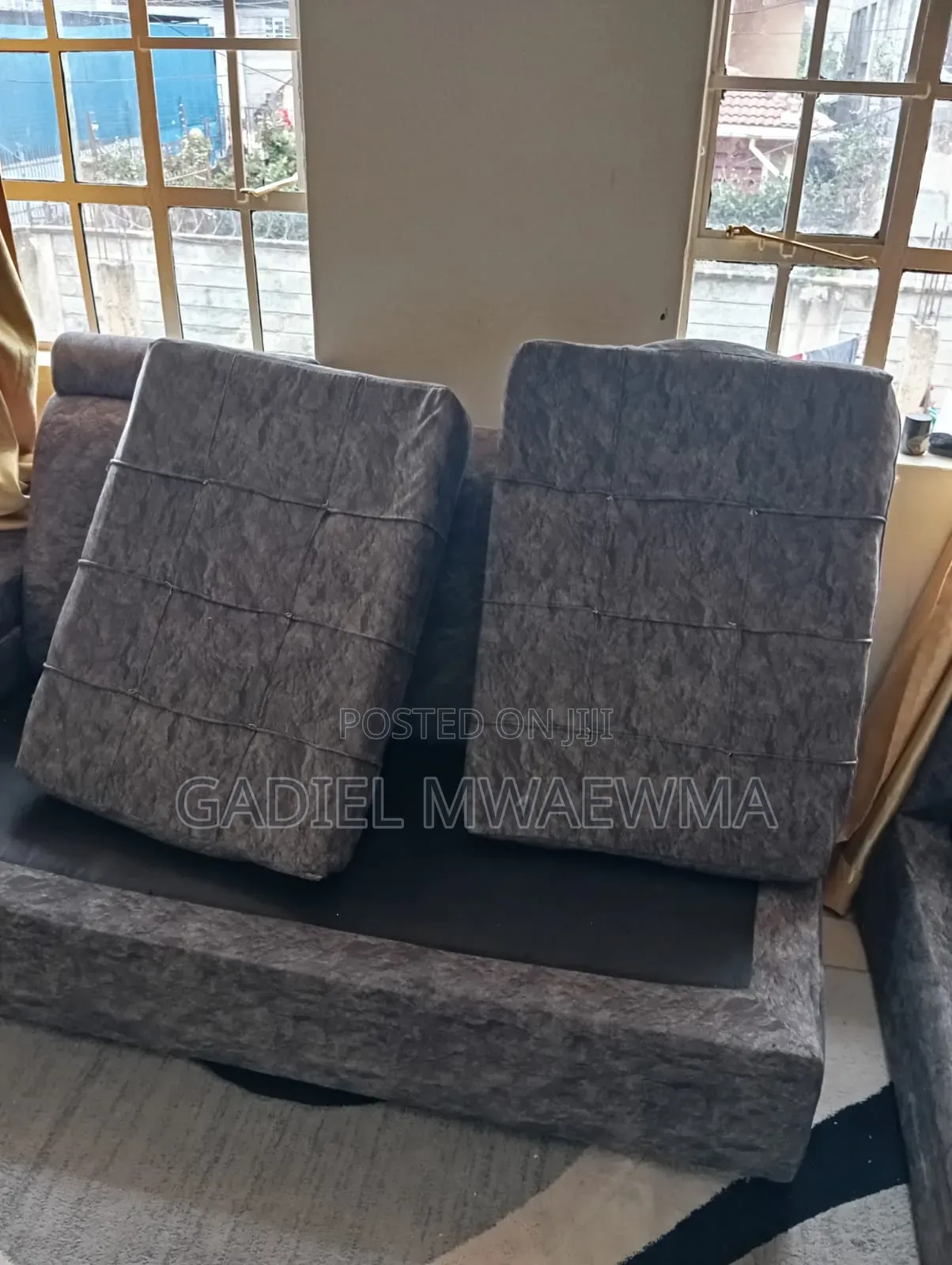 Used Grey L-Shaped Sofa in Good Condition. Comes With Mini Tables