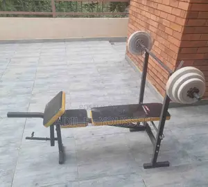 Workout Weight Bench With Six Weights. 2x of 1kg, 2.5kg and 5kg.