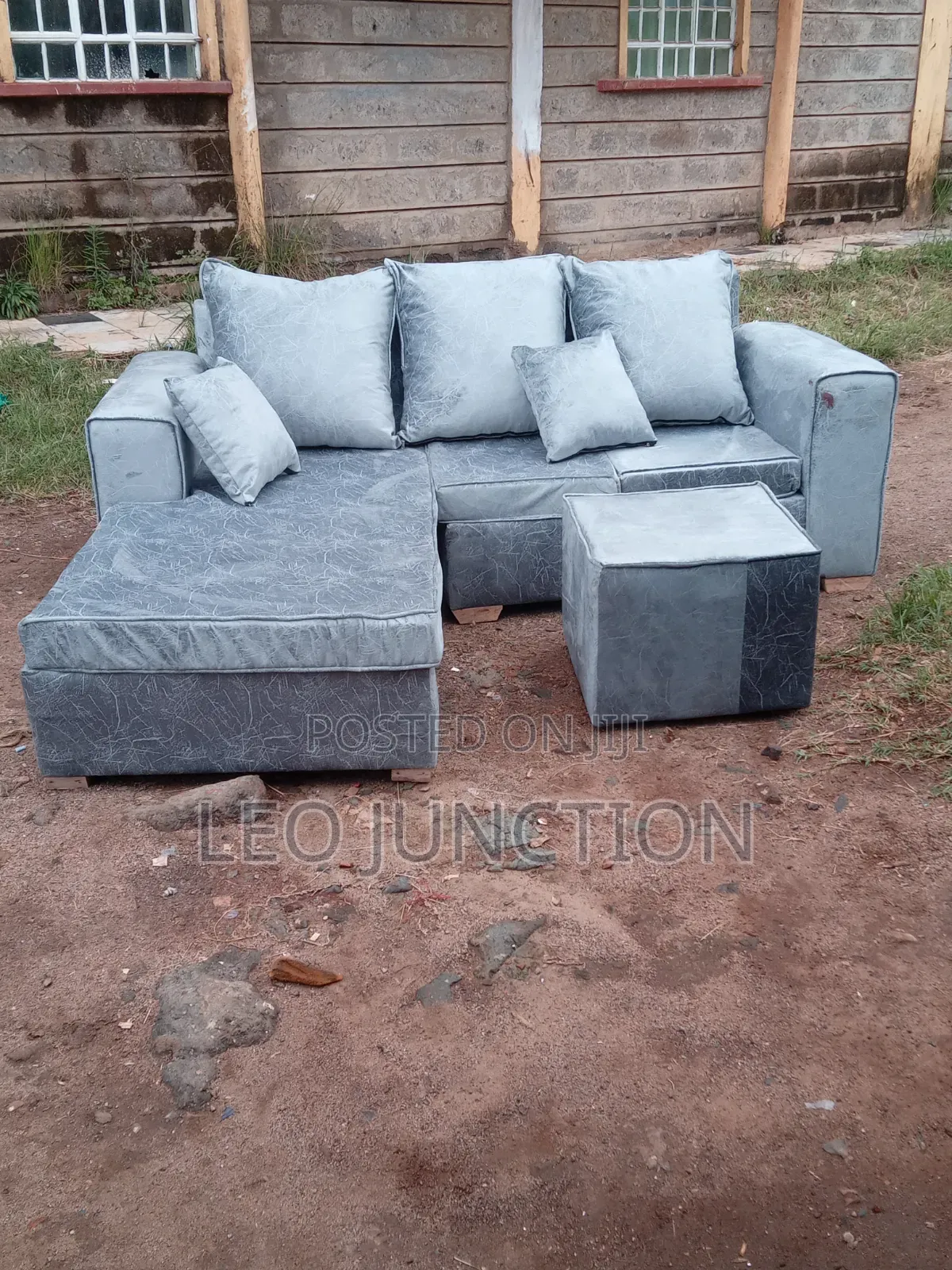 Gray L Seat With a Stool