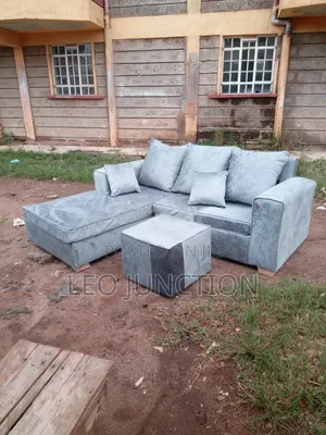 Gray L Seat With a Stool