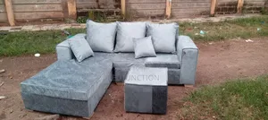 Gray L Seat With a Stool