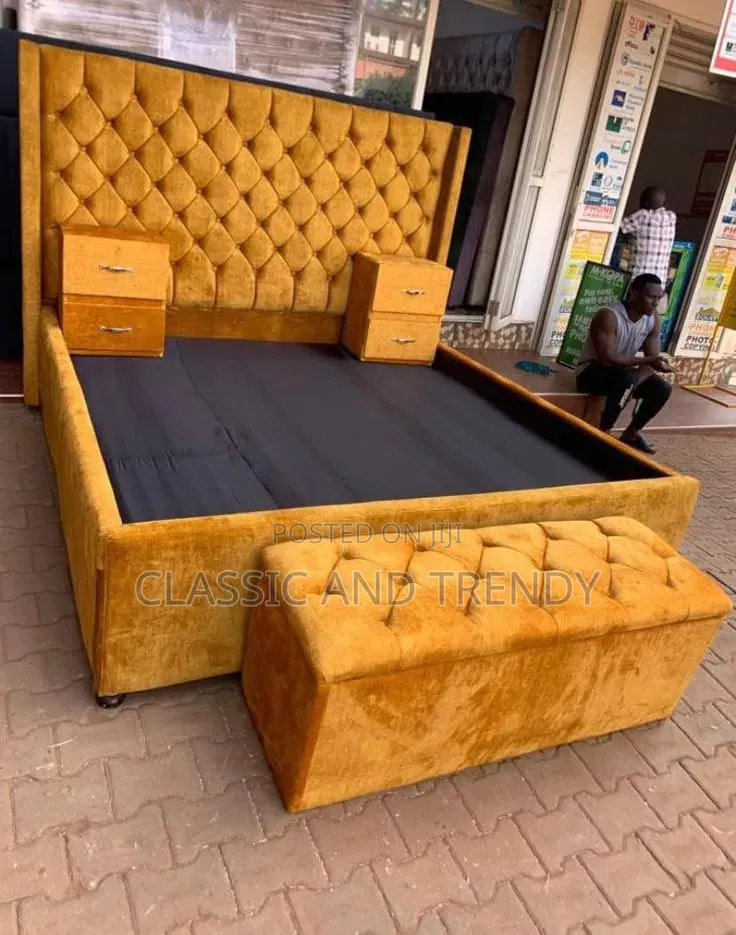King Size Bed With Bedside Drawers and an Ottoman