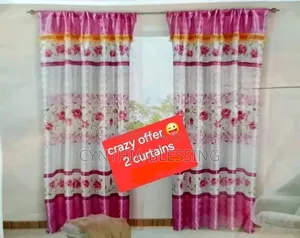 A Set of 3m Curtains and 2m Sheers.