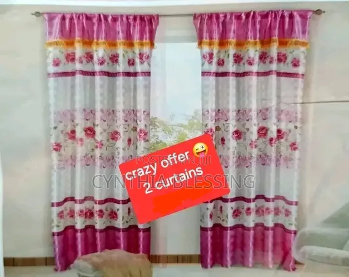 A Set of 3m Curtains and 2m Sheers.