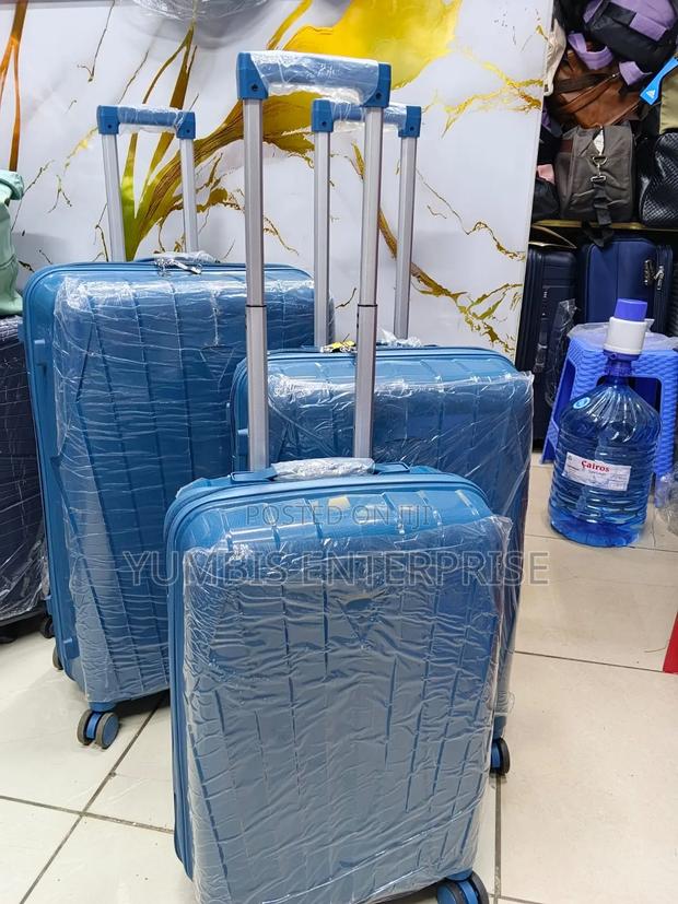 Turquoise Blue Rubber Unbreakable Suitcase Set of Size 29 3in1 - main view