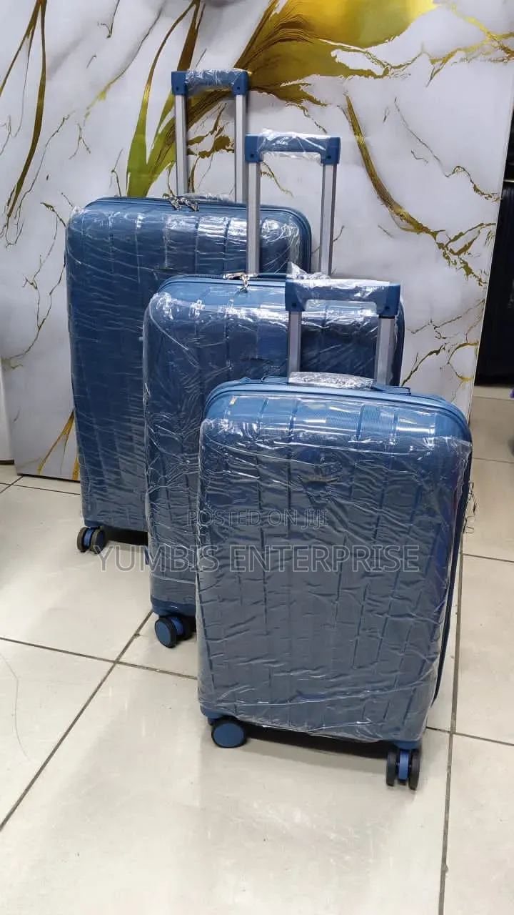 Turquoise Blue Rubber Unbreakable Suitcase Set of Size 29 3in1