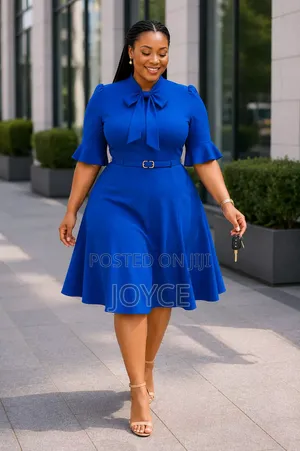 Circular Plain Dress With a Bowtie