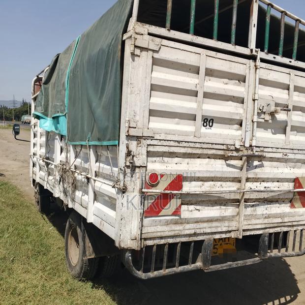 Isuzu NKR Canter 2002 White - thumbnail 2
