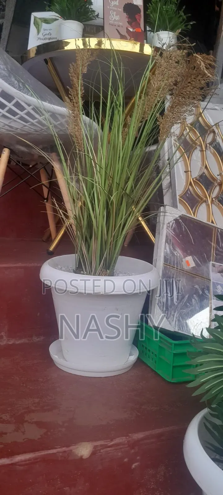 Generic Artificial Flower Arrangement in a White Bucket Vase