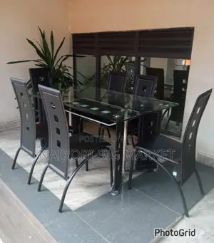 Executive 6 Sitter Glass Dinning Table With Leather Seat