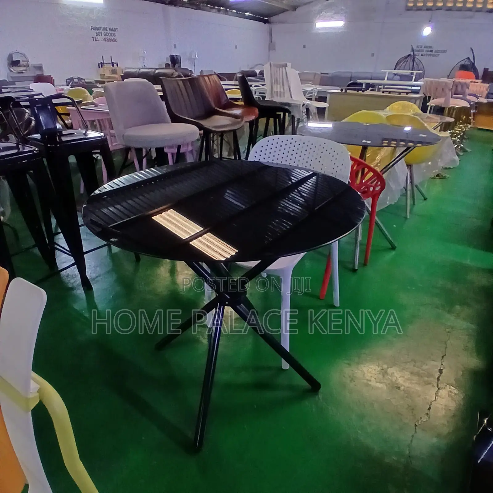 Dining Table: Circular Glass Table With Tripod Base for Two