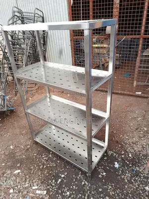 Stainless Steel Rack Appears to Be a Commercial Kitchen Storage