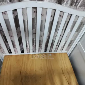 Baby Cot Medium Size Together With Mattress.