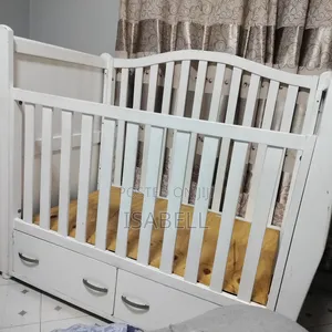 Baby Cot Medium Size Together With Mattress.