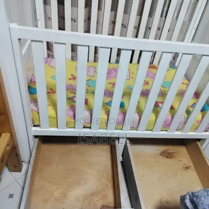 Baby Cot Medium Size Together With Mattress.