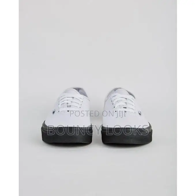 White Upper With Black Sole Vans
