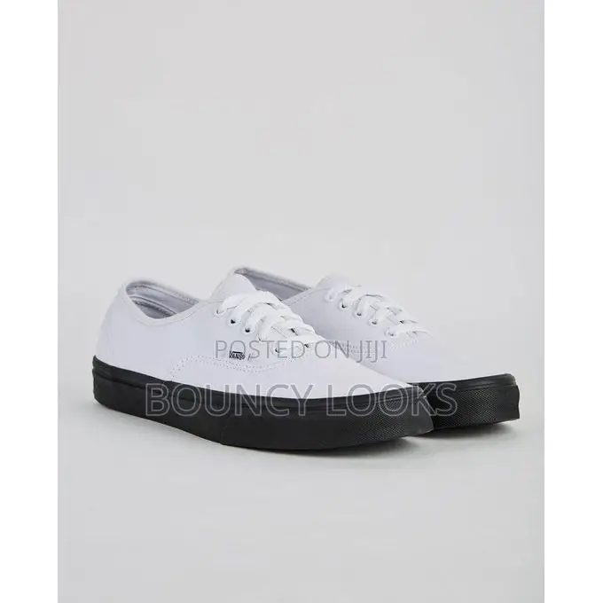 White Upper With Black Sole Vans
