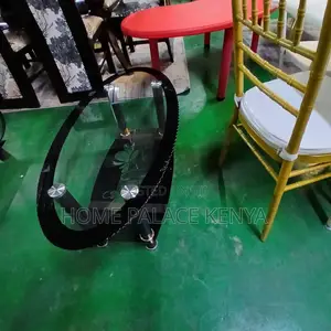 Coffee Table: Minimalist Oval Glass Table With Black Details
