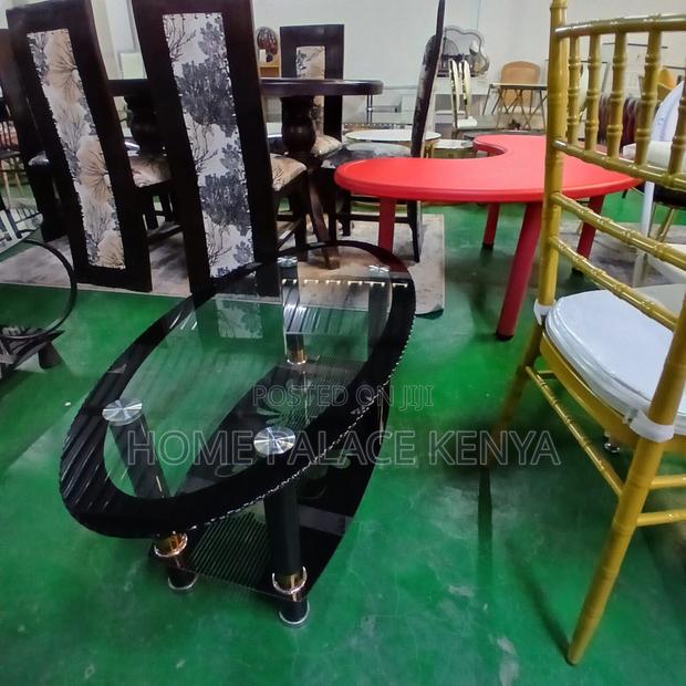 Coffee Table: Minimalist Oval Glass Table With Black Details - thumbnail 6