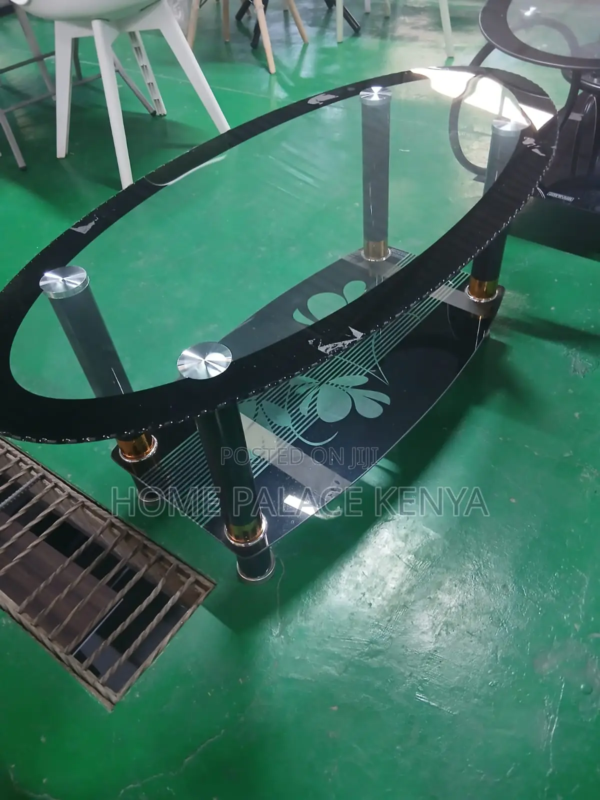 Coffee Table: Minimalist Oval Glass Table With Black Details