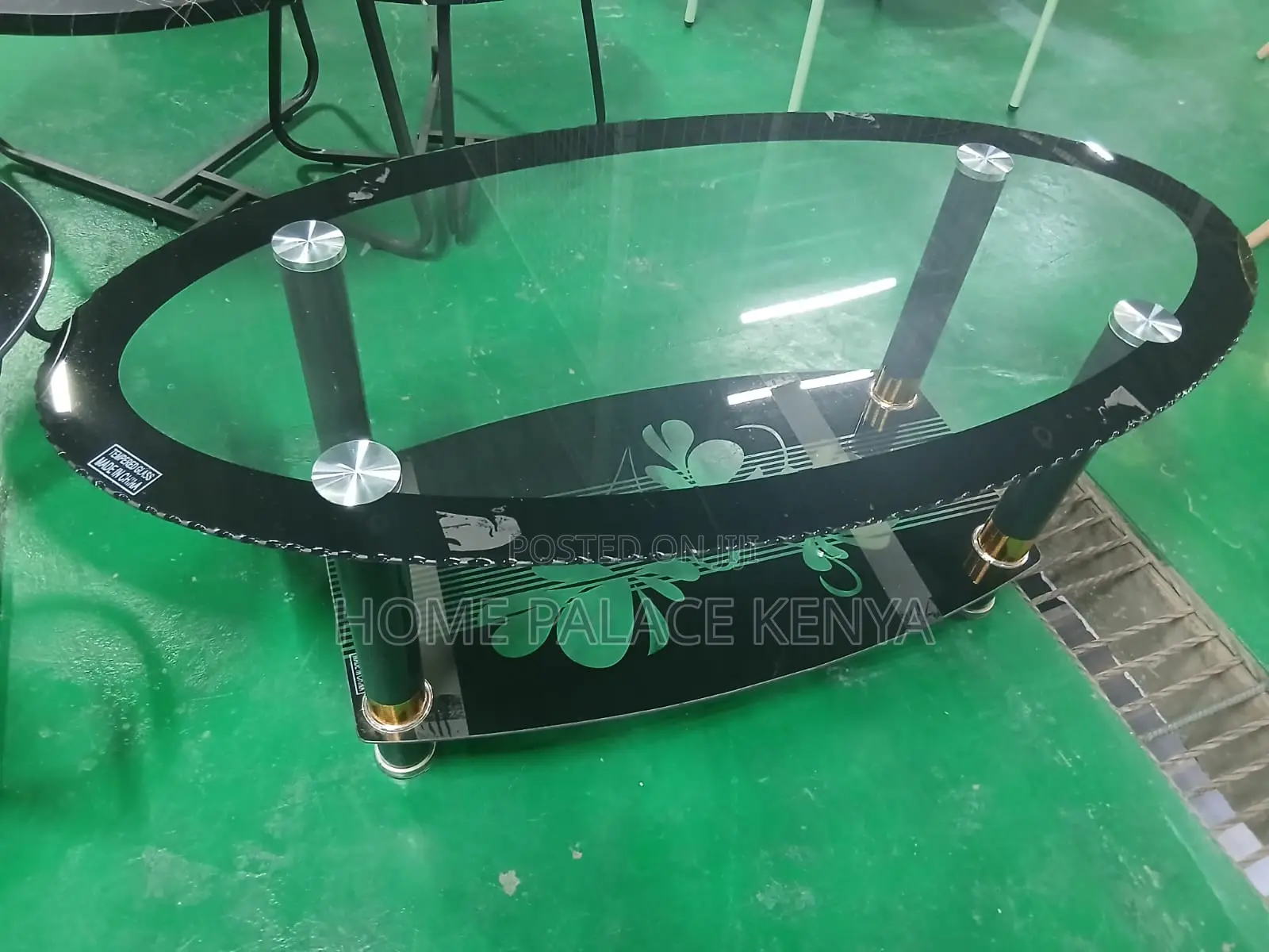 Coffee Table: Minimalist Oval Glass Table With Black Details