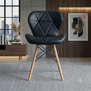 Dining Chairs; Black Butterfly Style Eames Chairs