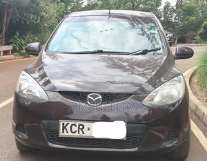 Mazda Demio 2011 Brown