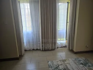 King-Size Bed With Mattress, 2 Nightstands, Dresser, and 3 Rugs.
