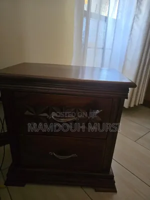 King-Size Bed With Mattress, 2 Nightstands, Dresser, and 3 Rugs.